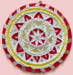 lippan art with red and yellow hues.