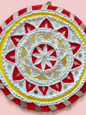 lippan art with red and yellow hues.