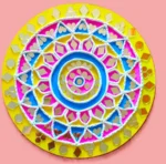 lippan art with yellow, blue, and pink, with mirrors that glow.