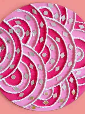 lippan art with pink with white accents and mirrors that sparkle.